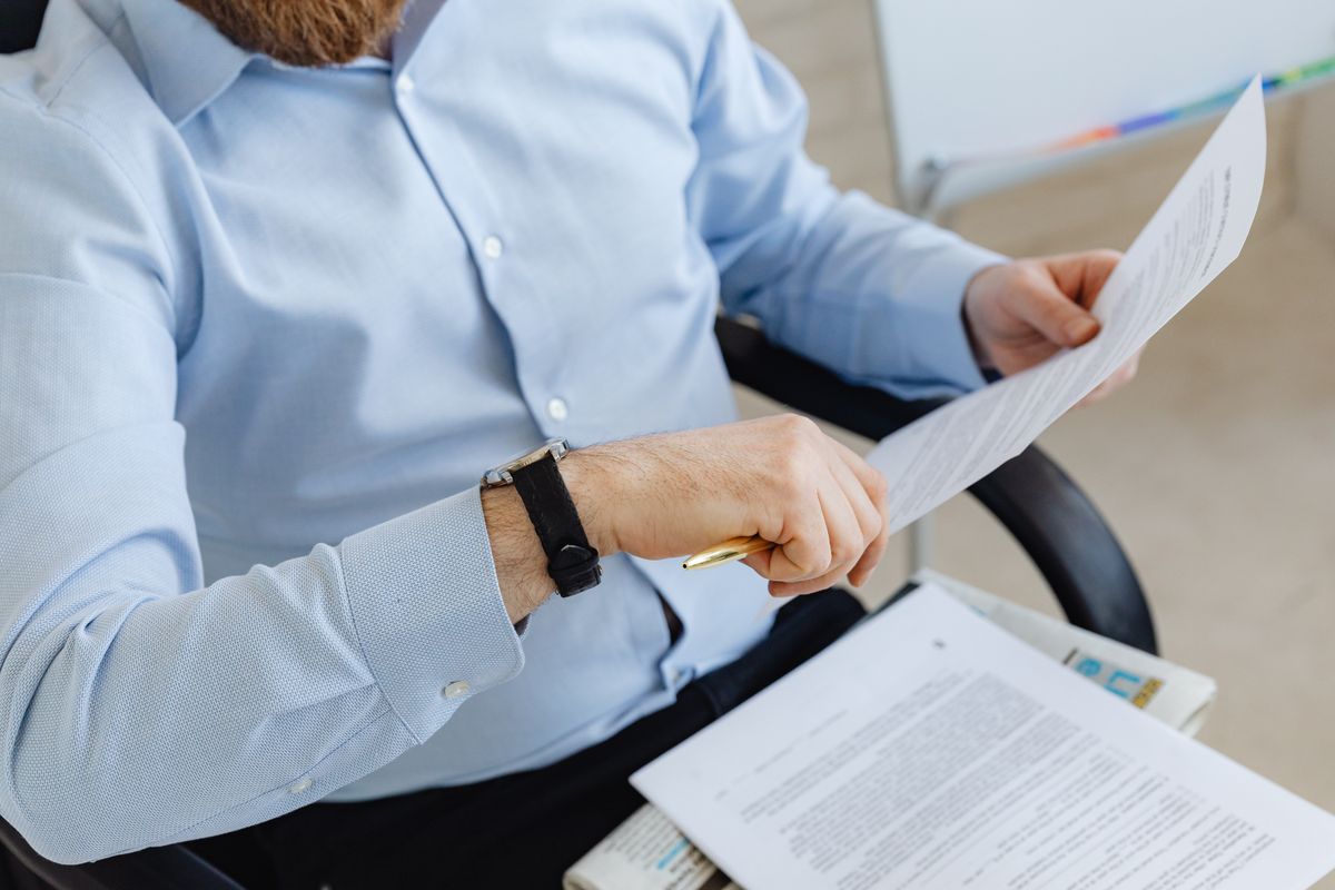 A regulatory affairs specialist reviewing documents